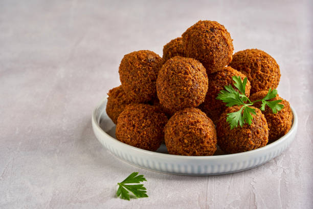 istock Fresh falafel with parsley. Closeup 1273370837