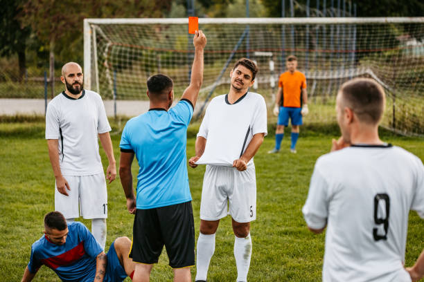 istock Soccer referee showing red card 1273371748