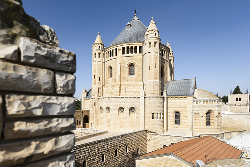 (Selective focus) Stunning view of the Abbey of the Dormition during a sunny day. The Abbey of the Dormition is an abbey and the name of a Benedictine community in Jerusalem, Israel.