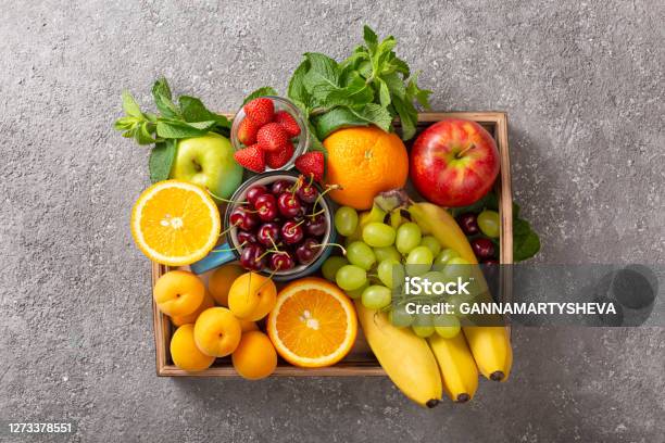 Set Of Summer Fruits And Berries In Wooden Serving Stock Photo - Download Image Now