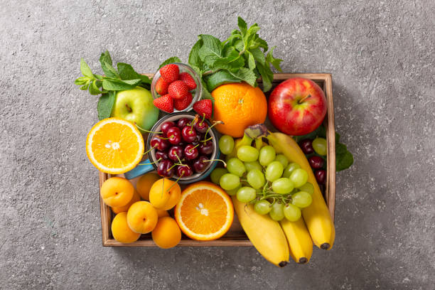 set of summer fruits and berries in wooden serving. - fruta imagens e fotografias de stock