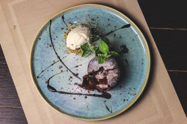 istock Chocolate fondant with vanilla ice cream flat lay 1273381486