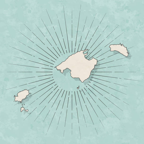 Balearic Islands map in retro vintage style - Old textured paper Map of Balearic Islands in a trendy vintage style. Beautiful retro illustration with old textured paper and light rays in the background (colors used: blue, green, beige and black for the outline). Vector Illustration (EPS10, well layered and grouped). Easy to edit, manipulate, resize or colorize. balearic islands stock illustrations