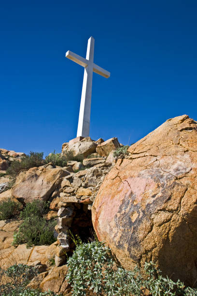 Cross on a hill stock photo
