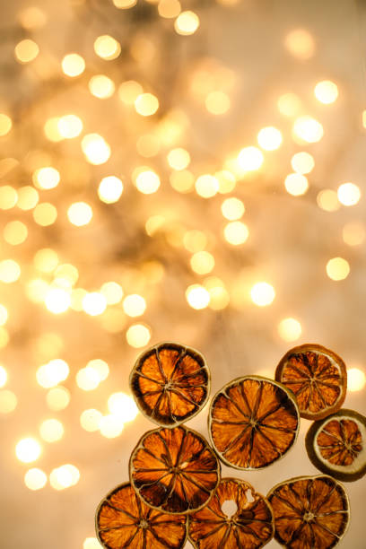 Directly above view of pieces of dry orange as decorations for Christmas time
