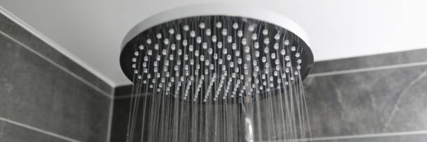 istock Close-up interior stylish shower spraying water 1273400534
