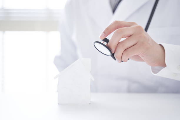 istock Image of diagnosing real estate in a doctor's outfit. 1273408187
