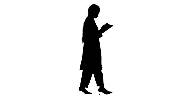 istock African American female doctor holding a tablet computer while w 1273408793