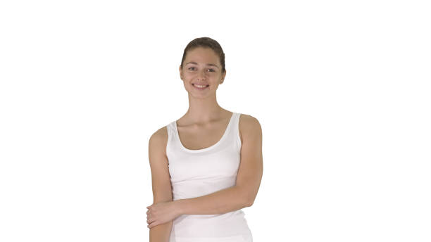 istock Good-looking caucasian woman walking and smiling on white backgr 1273421107