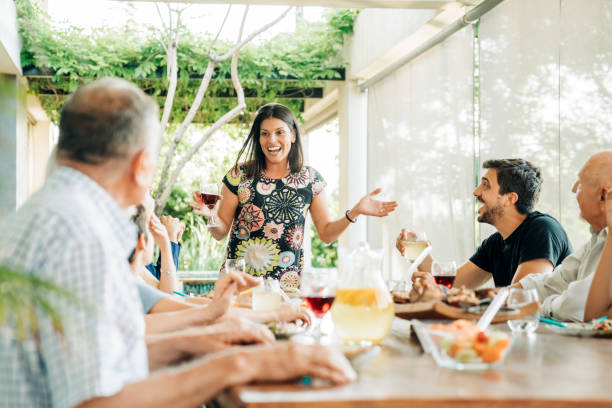 istock Family enjoying drinks at patio during weekend 1273422871