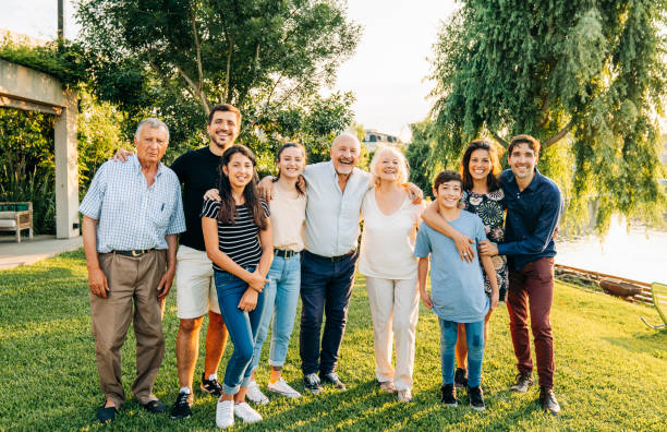 istock Cheerful extended family enjoying weekend together 1273423626