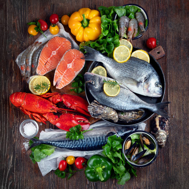 istock Assortment of fresh raw fish and seafood 1273424609