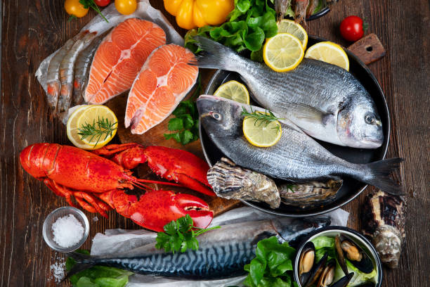 istock Assortment of fresh raw fish and seafood 1273424643
