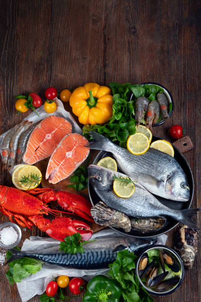istock Assortment of fresh raw fish and seafood 1273424701