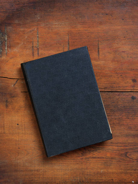 istock Vintage book on wooden background, copy space 1273432225