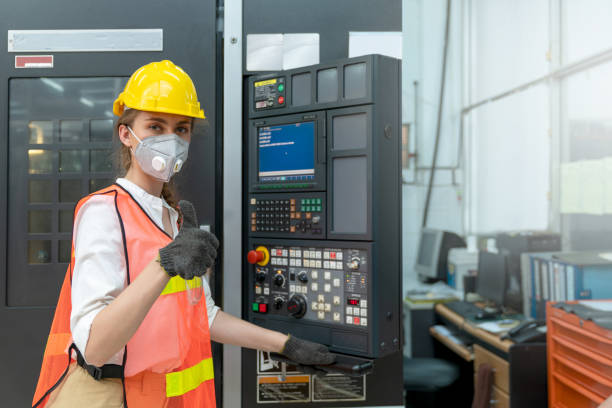 istock Confident worker wearing particulate respirator mask with hard hat giving thumb up 1273433477