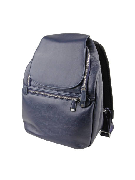 istock New dark blue female leather bag or backpack isolated on white 1273436451
