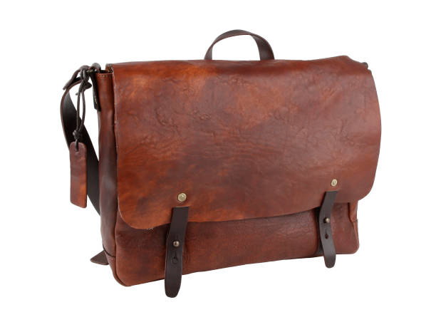 istock New bag in light brown leather. Isolated on white 1273436452