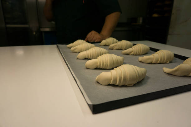 istock Handmade elaboration of the croissant 1273438500