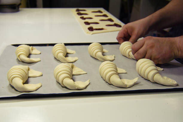 istock Handmade elaboration of the croissant 1273438514