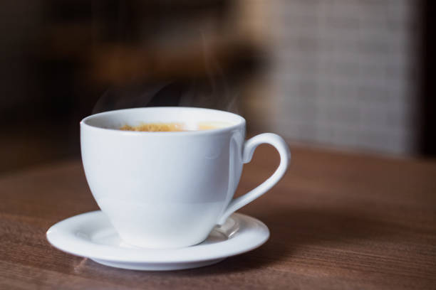 istock White cup of aromatic coffee on a wooden table 1273438718