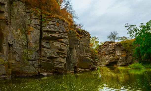 istock small river flow in a mountain canyon, autumn mountain river scene 1273439976