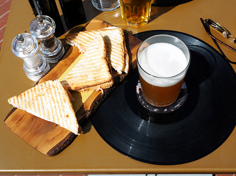 Glass of beer on wooden table,Top view