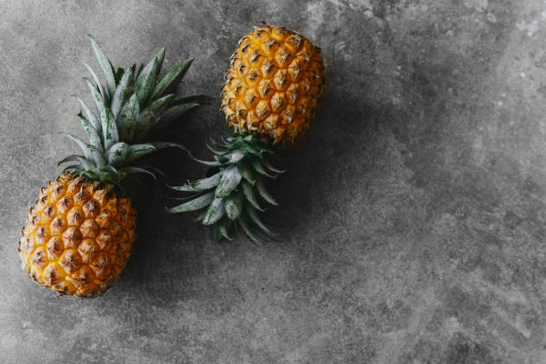 istock Pineapple on a stone table. Tropical Fruits. 1273442869