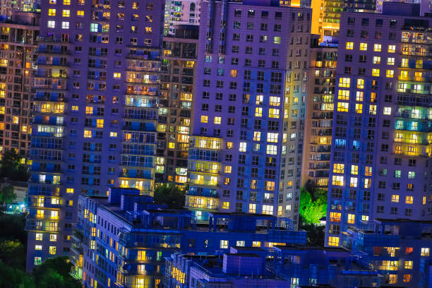 istock Window in high-rise apartment at night 1273445298
