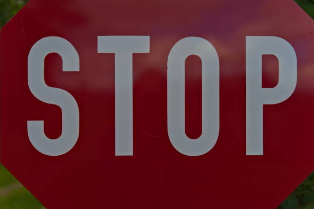 istock Full stop red and white road sign commonly found while driving in Europe. 1273445989