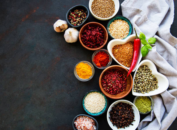 istock Various spices in a bowls on a black 1273446961