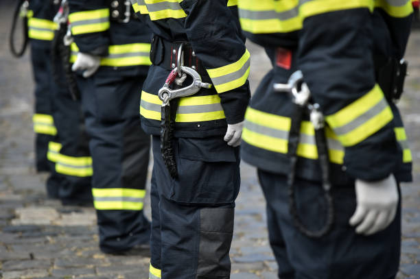 istock Fire fighters uniform detail with carabiner and harness during ceremony 1273448214