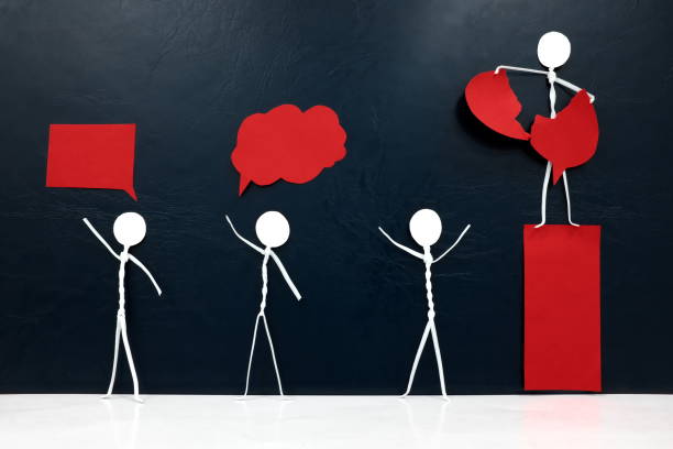 istock Suppression, fascism and oppression by authority, dictatorship, authoritarian leadership and violation of freedom of expression concept. Human stick figure tearing down red speech bubble. 1273455760