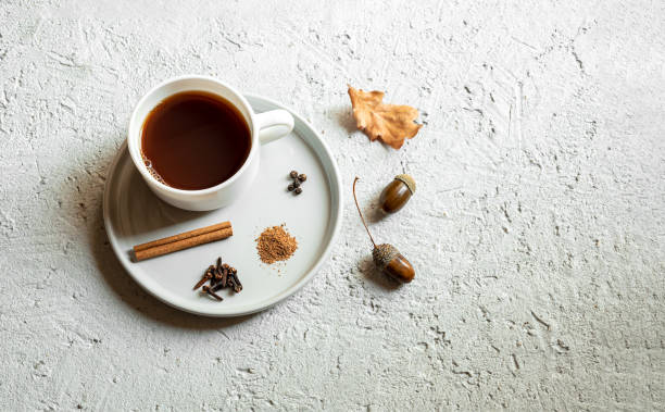 istock Cup of acorn coffee on a gray background 1273460008