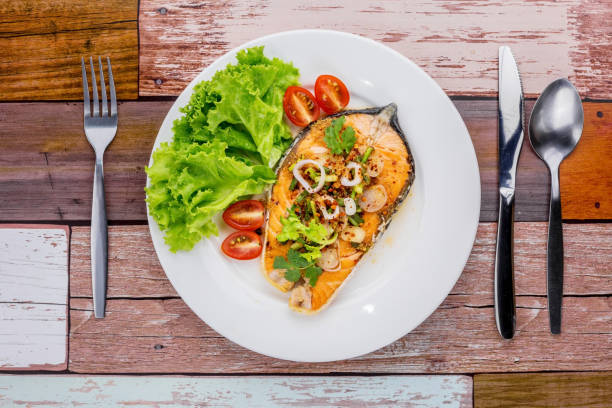 istock Spicy fried salmon salad 1273460857