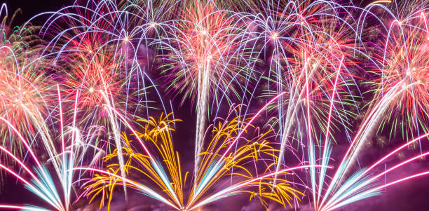 istock Colorful fireworks explosion and display on night sky. 1273463454