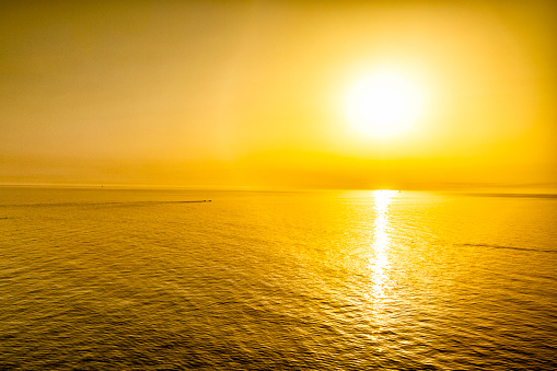 Background of clear sky at sunrise or sunset on the sea