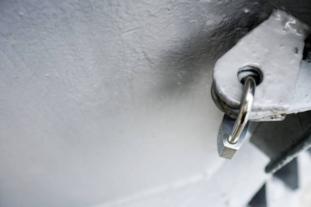 istock Close up on the silver Padlock. Over look. 1273465546