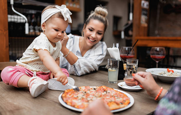 istock Happy family having lunch together 1273468038