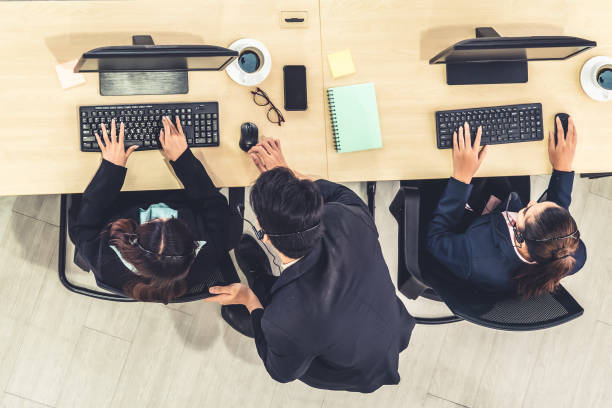 istock Business people wearing headset shot from top view 1273475306