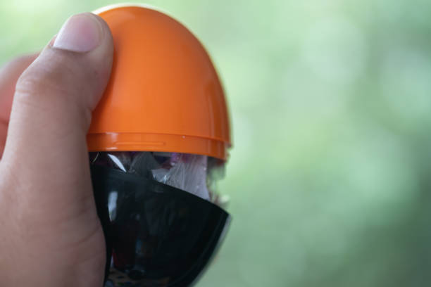 istock Egg shape made from plastic orange-black colour and open inside some mini toy to surprise and random. Toy surprise egg 1273476410