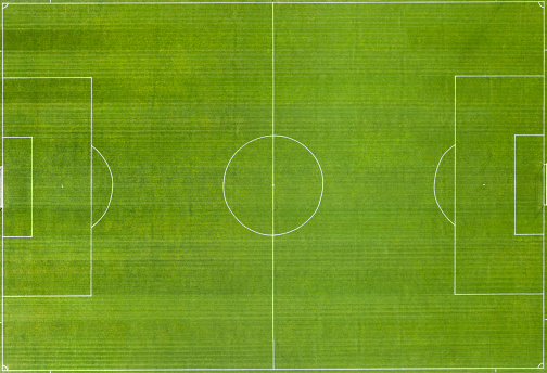 aerial view of soccer field with green grass