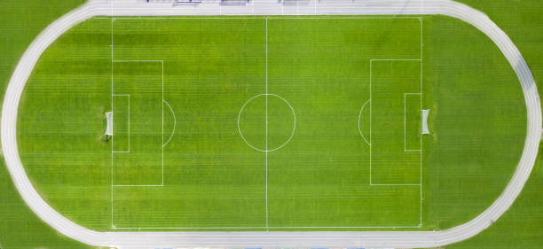 istock Soccer field with white markings. Top view. 1273476829