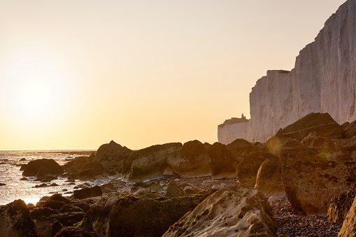 Beachy Head cliffs and Belle Tout lighthouse at sunset, Eastbourne , East Sussex