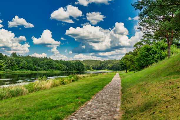 istock Beautiful Panoramic View With Amazing Clouds. Amazing River and Forest Landscape, Stepping Stone. Lithuania 1273478093