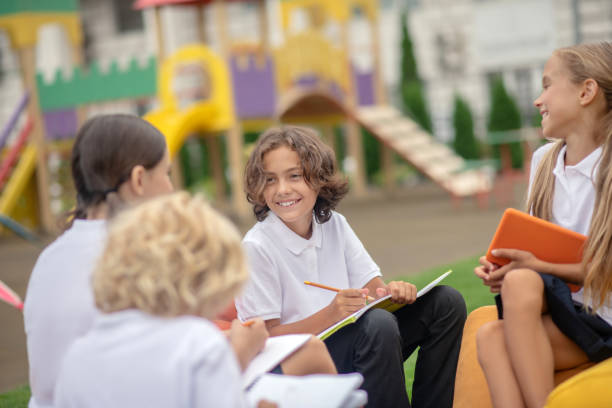 istock Group of pupils studying together and feeling positive 1273478990
