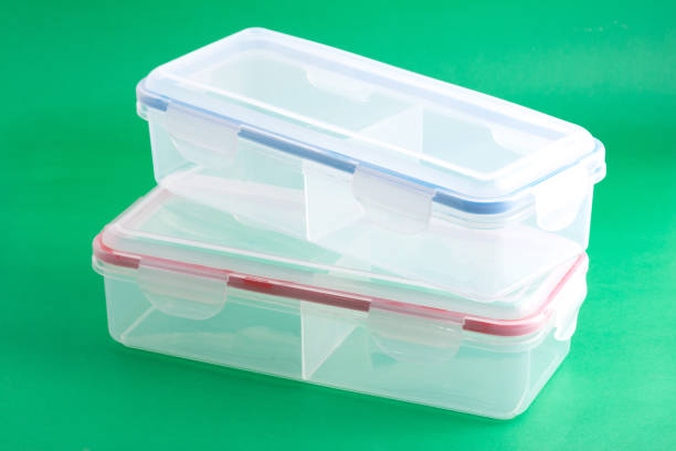 istock Multipurpose Plastic Container With Airtight Lid; Photo On Green Background. 1273480790
