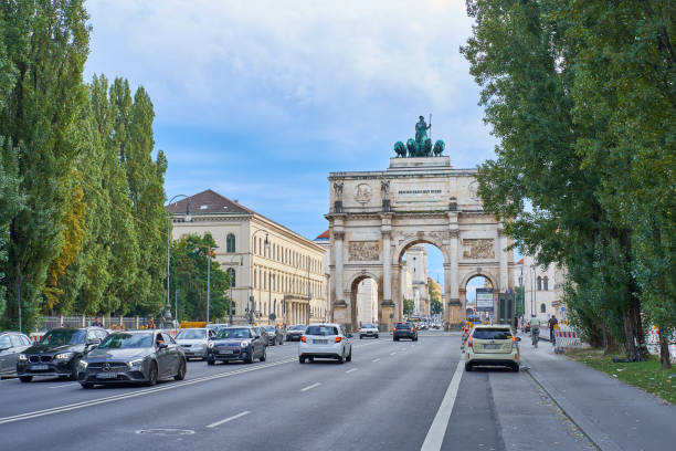 The Victory Gate in Munich Munich, Bavaria / Germany - September 05, 2020: The Siegestor (Victory Gate) in Munich. Triumphal arch crowned with a statue of Bavaria siegestor stock pictures, royalty-free photos & images