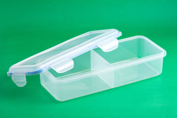 istock Multipurpose Plastic Container With Airtight Lid; Photo On Green Background. 1273480987