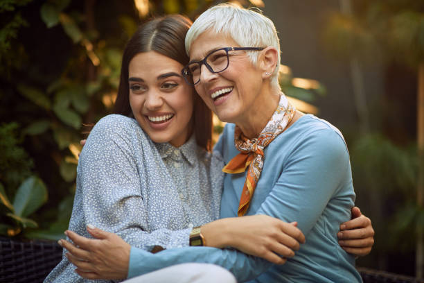 istock elderly mother and young adult daughter hugging each other 1273483607